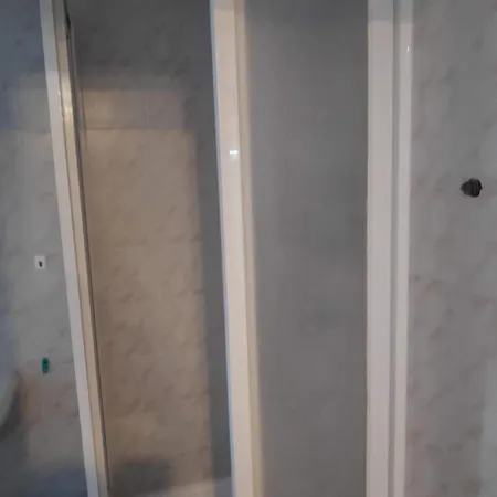 Quarto em Acomodações Particulares Casa De Vasco-estadia Familiar E Tranquila Amora